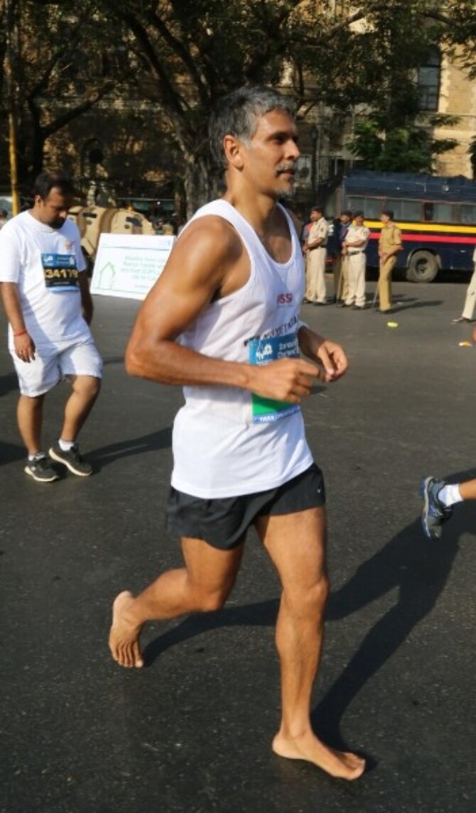 milind soman running slippers
