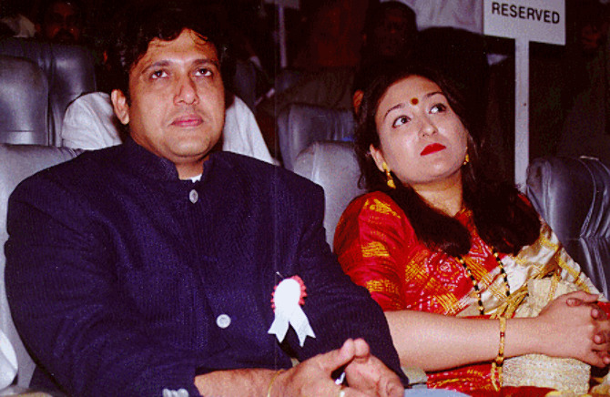 Govinda And Wife Govinda Photos On Rediff Pages