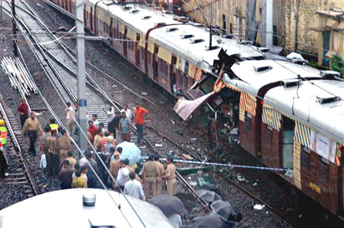 mumbai train blast 2 P 060711 : local train of mumbai on Rediff Pages